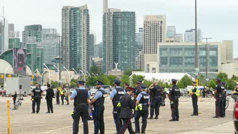 Military-funeral-in-Toronto,-Canada---Police-officers-showing-respect-to-the-fallen