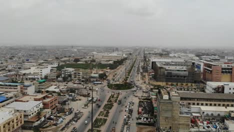 Aerial-View-Of-Busy-Highway-And-Roundabout-In-Industrial-Area-In-Karachi