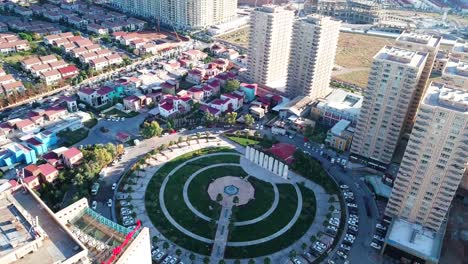 Aerial-view-of-Sakura-Park---and-100m-Street-in-Erbil-showing-MRF-towers---Roya-Tower-and-houses