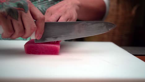 Chef-slice-pink-tun-in-slow-motion-camera-follow-action-Latin-Mexican-recipe-Ceviche-Carpaccio-Sashimi