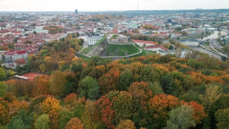 AERIAL:-Gediminas-Castle-Hill-in-Autumn-with-Vilnius-City-Panorama