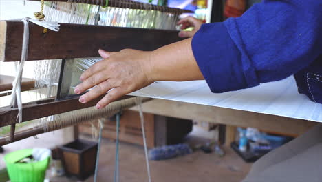 Traditional-Handmade-Cotton-Weaving-Free-Standing-Loom-with-longitudinal-threads-the-warp,-and-the-lateral-threads-are-the-weft,-woof,-or-filling