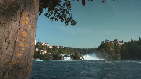 Famous-scenic-view-of-castle-on-cliffs-at-Rhine-Falls-in-Schaffhausen-Switzerland,-Europe