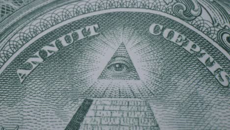 Close-Up-Pan-of-the-Pyramid-Symbol-on-the-Back-of-a-One-Dollar-Bill