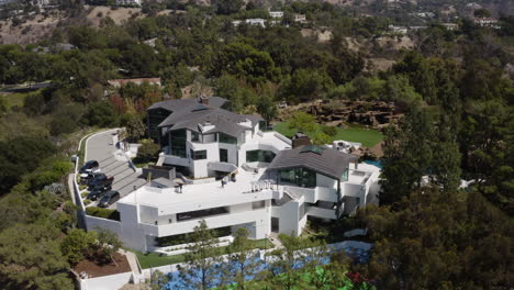 Enormous-mansion-in-Beverly-Hills-California-with-water-slide,-basket-ball-court