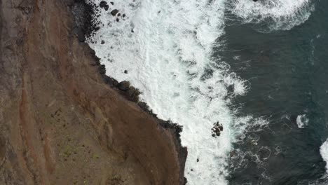 Aerial-is-ascending-counter-clockwhise-above-cliffs-of-Sao-Laurenco,-Madeira