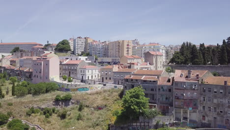 Drone-aerial-shot-of-run-down-buildings-in-Casal-Ventoso,-a-neighborhood-in-Lisbon-known-as-the-epicenter-of-Portugal's-drug-crisis