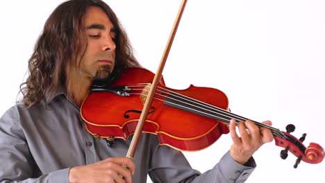 Hispanic-male-musician-with-long-brown-hair-playing-red-viola-instrument-in-slow-motion-against-white-backdrop