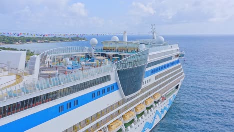 Luxury-cruise-ship-anchored-in-La-Romana-port,-Dominican-Republic