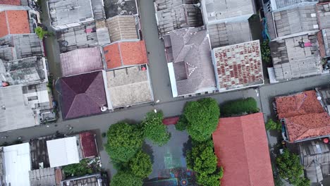 POV-from-top-aerial-shot,-residential-areas-are-flooded