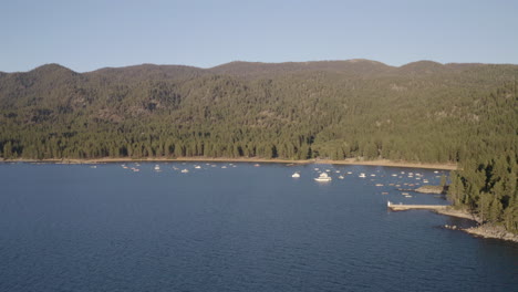 Boats-and-watercraft-rest-moored-in-Marla-Bay-Lake-Tahoe-in-Nevada