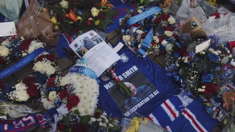 Close-up-of-tributes-at-Ibrox-Stadium-for-former-Scotland,-Rangers,-and-Everton-manager-Walter-Smith