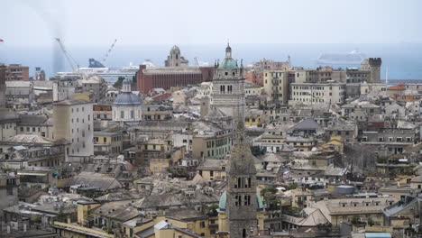 Beautiful-cityscape-of-Genoa-city-with-towers-and-rooftops,-tilting-up-view