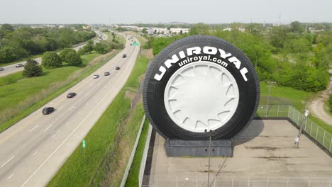 Giant-Uniroyal-Tire-display,-Detroit,-Michigan-in-Allen-Park-Michigan,drone-view