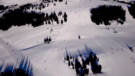 Aerial-view-of-a-ski-slope-in-a-ski-resort-in-the-Tyrolean-Alps-in-Austria