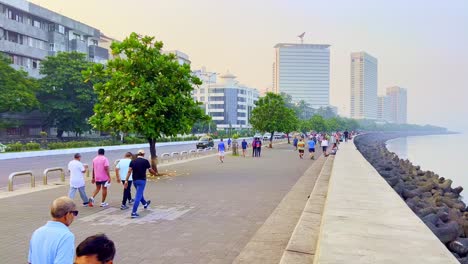 A-view-of-people-going-for-a-morning-walking-along-the-beach-road