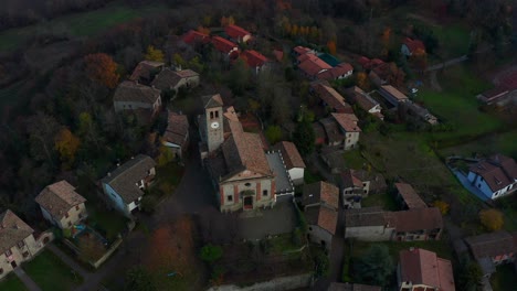 Aerial-View-Of-The-Church-of-Santa-Maria-and-San-Giorgio-In-Fortunago-Comune-In-Lombardy,-Italy