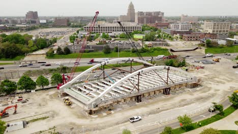 Construction-of-second-Avenue-Bridge-in-Detroit-city,-aerial-drone-orbit-view
