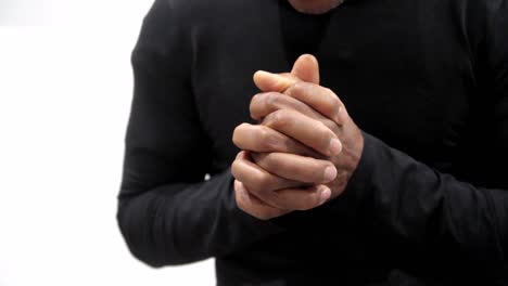 praying-to-god-with-hands-together-on-white-background-with-people-stock-video-stock-footage