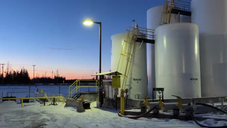 Dawn-Over-the-Fuel-Tanks:-A-Pan-Right-Shot-of-Bulk-Fuel-Storage-at-Sunrise