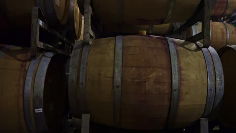 A-zoom-in-shot-of-a-wine-cask-in-a-storage-unit