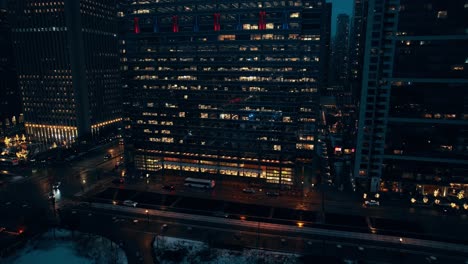 rising-night-aerial-above-chicago-downtown-iluminated-streets