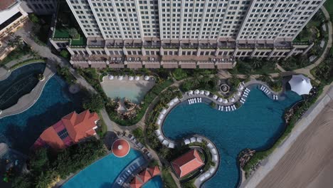 Aerial-view-of-Grand-Hotel-Ho-Tram,-vietnam-featuring-buildings-and-swimming-pool