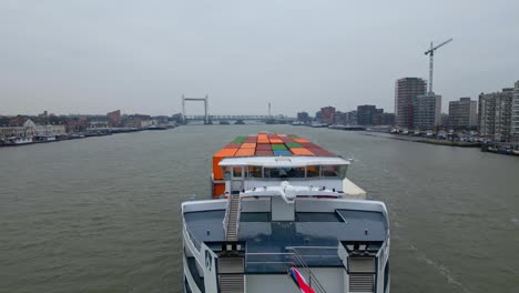 29-January-2023---Stern-View-Of-Scaldis-Container-Ship-Travelling-Along-Oude-Maas-On-Overcast-Day-In-Dordrecht
