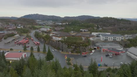 Sundheimen-nursing-home-for-elderly-in-Skogsvag-Oygarden-Norway---Aerial-looking-at-nursing-home-in-Skogsvag-center