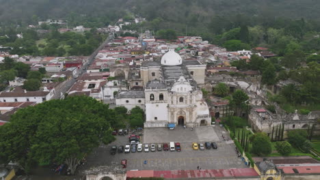 Rotating-aerial-footage-of-the-crumbling-facade-of-a-cathedral-in-Antigua,-Guatemala