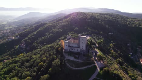 Aerial-panorama-of-medieval-fortress-of-Narni-on-top-of-a-green-hill