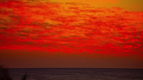 Red-ocean-sunset,-fusion-time-lapse-view