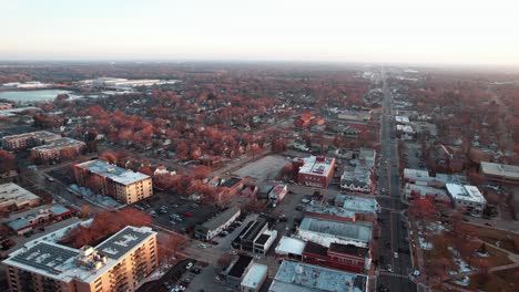 orbiting-around-Libertyville,-Illinois,-USA-sunset-aerial-4k