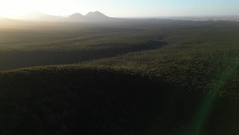 Tracking-aerial-shot-at-sunset-of-Australian-mountain-ranges