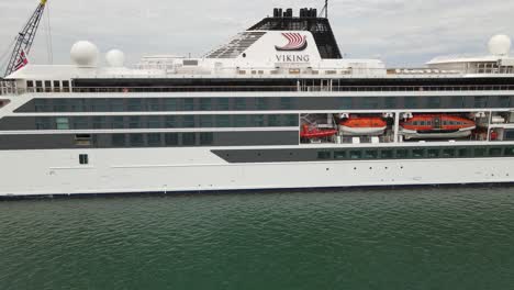 Side-view-of-Norwegian-Cruise-Ship,-Viking-Octantis,-docked-in-Detroit-MIchigan,-USA