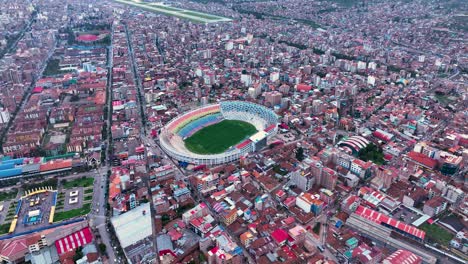 Garcilaso-stadium-within-city-Cusco,-Peru,-South-America,-Andes---Aerial-above-view-drone-high-resolution-4k