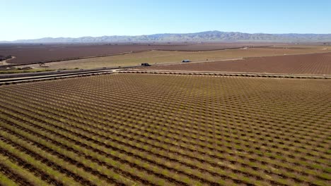 san-joaquin-river-valley-with-almond-fields-below-near-modesto,-california