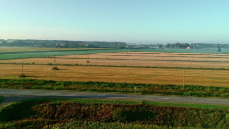 Aerial-shot-of-fields-on-a-farm-on-a-sunny-day