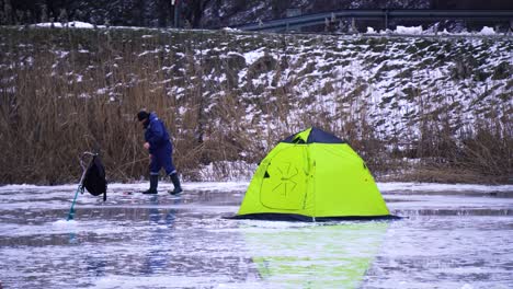 Arrival-fish-tents-in-the-evening-on-the-frozen-Lake-Latvia
