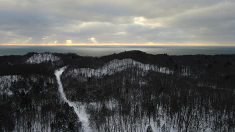 Lake-Michigan-Winter.-Sun-setting-through-dense-clouds