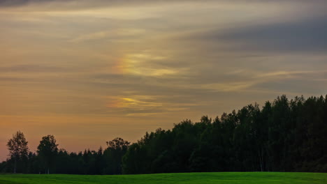 Timelapse-of-rainbow-moving-in-the-clouds-and-then-turning-to-dusk