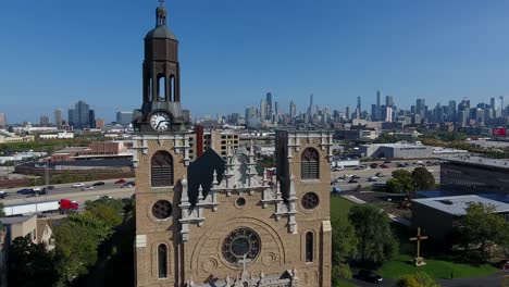 Chicago-USA,-Aerial-View,-St-Stanislaus-Kostka-Church-and-Interstate-90-Highway-Traffic-on-Sunny-Autumn-Day,-Revealing-Drone-Shot