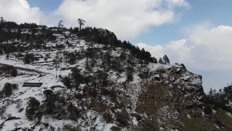 Drone-De-Montaña-Cubierta-De-Nieve-En-Las-Zonas-Rurales-De-Nepal