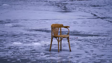 The-chair-rests-on-ice,-creating-a-feeling-of-weightlessness-and-levitation