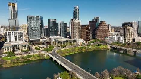 Aerial-shot-of-downtown-Austin,-TX-with-the-Colorado-River-in-frame