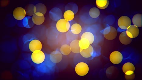 Digital-abstract-animation-blue-and-yellow-bokeh-blurred-lights-moving-on-black-background