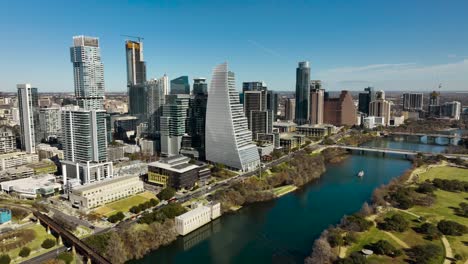 Aerial-shot-of-downtown-Austin,-TX-with-the-Colorado-River-in-frame