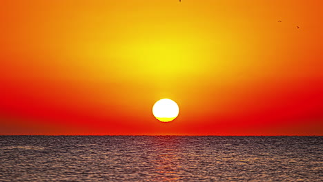 Amazing-timelapse-shot-of-burning-red-sunrise-above-the-ocean
