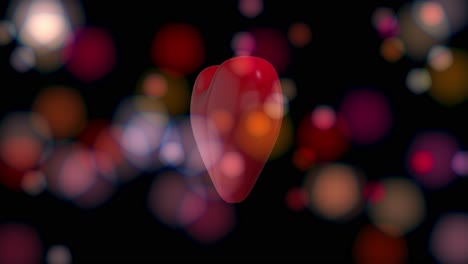 3D-red-semi-transparent-heart-rotating-in-loop-on-animated-colored-blurred-bokeh-background