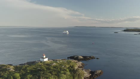 Up-and-to-the-right-of-lighthouse-with-ferry-in-background